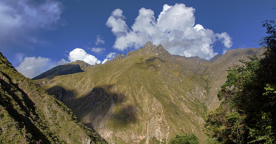 A Golden Summit Beneath the Billowing Clouds