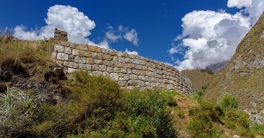 A Stone Wall Along the Sunlit Hillside