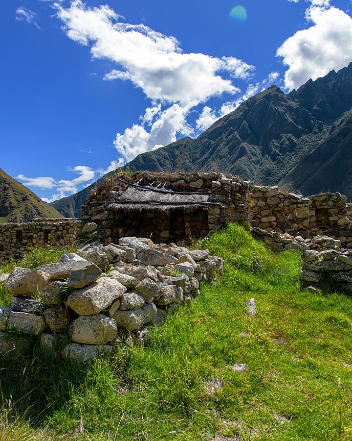 A Small Thatched Roof Among the Mountain Ruins