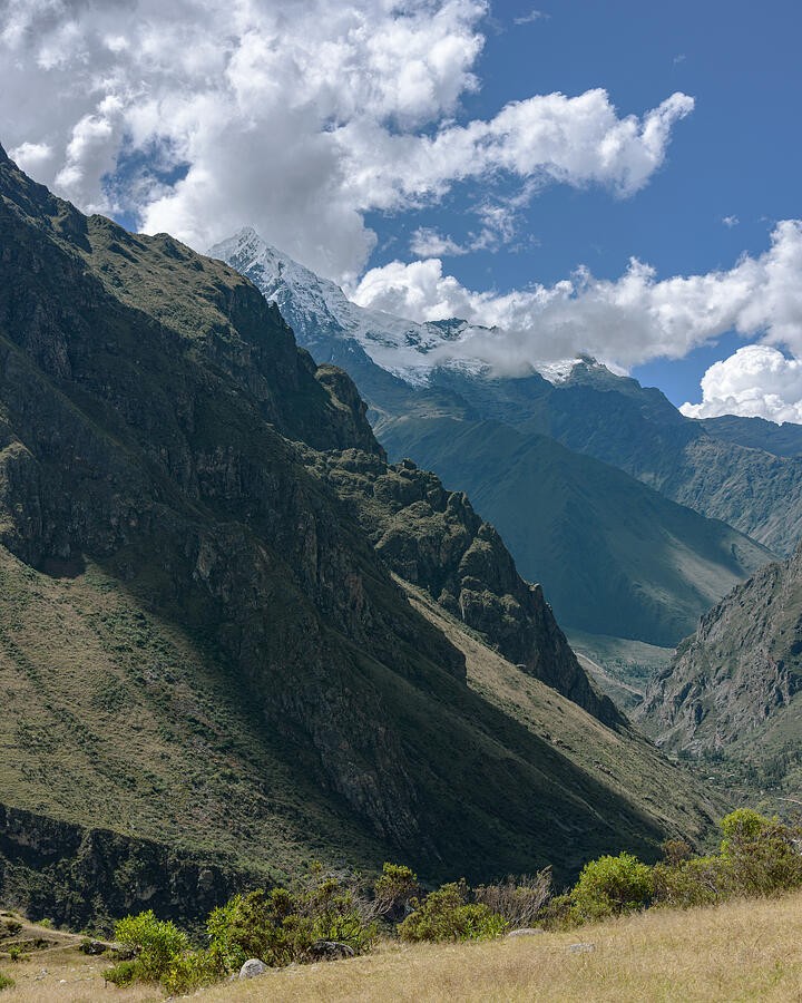 Clouds Drifting Along the Deep Green Valley