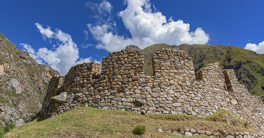 A Broad Stone Wall on the Grassy Hillside