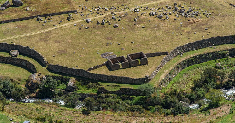 Curving Stone Walls Above the Narrow River