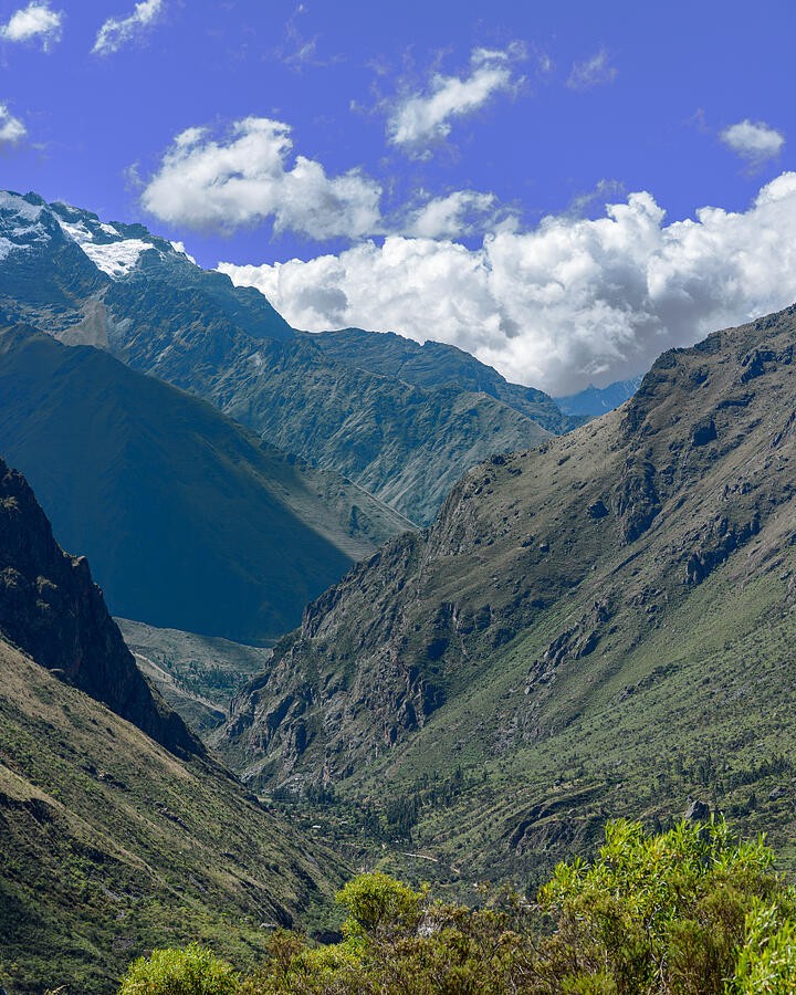 A Deep Mountain Valley Beneath the Bright Clouds