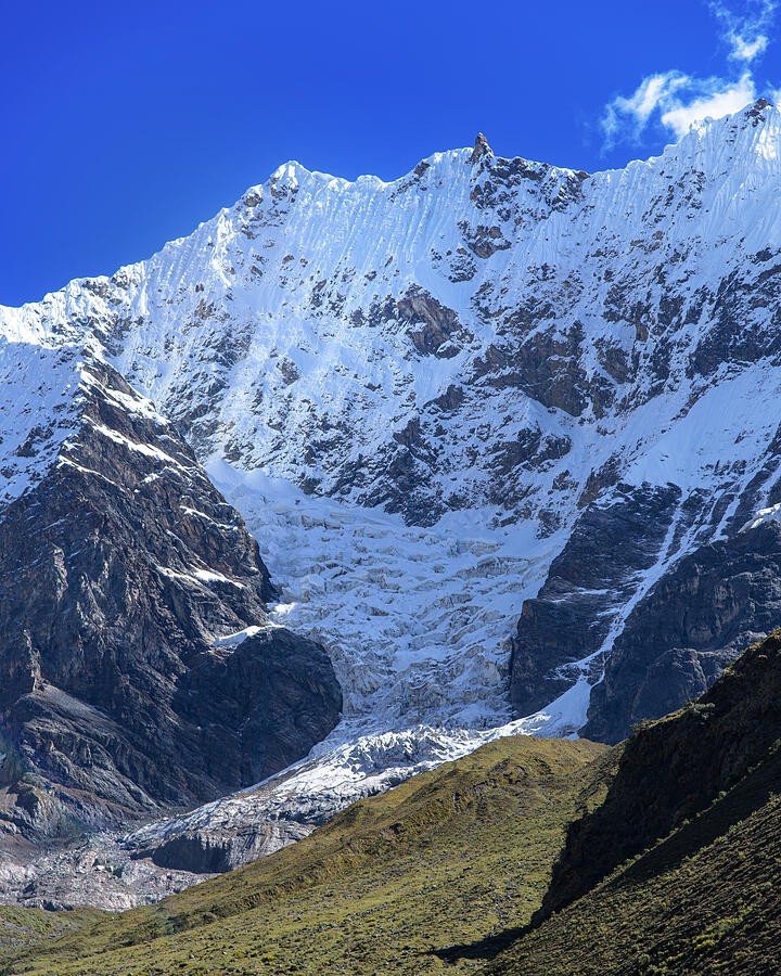Snow and Dark Rock on the Mountain Face