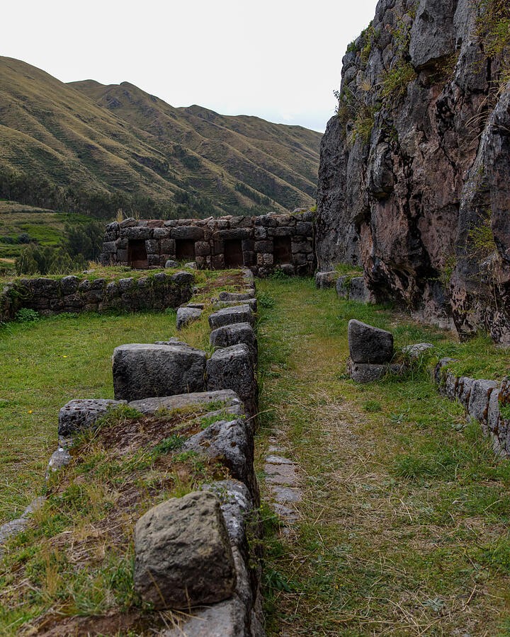 A Green Passage Between Stone Foundations