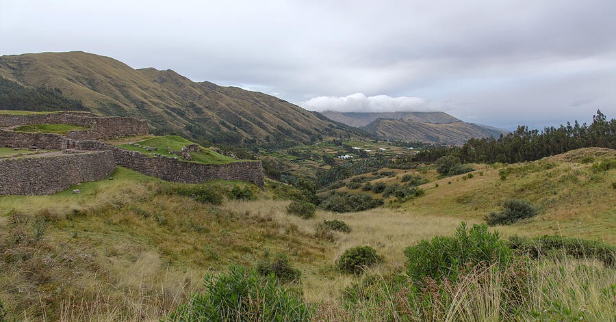 Low Stone Enclosures Across the Hillside