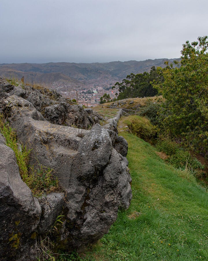 Weathered Rocks Above the Distant City