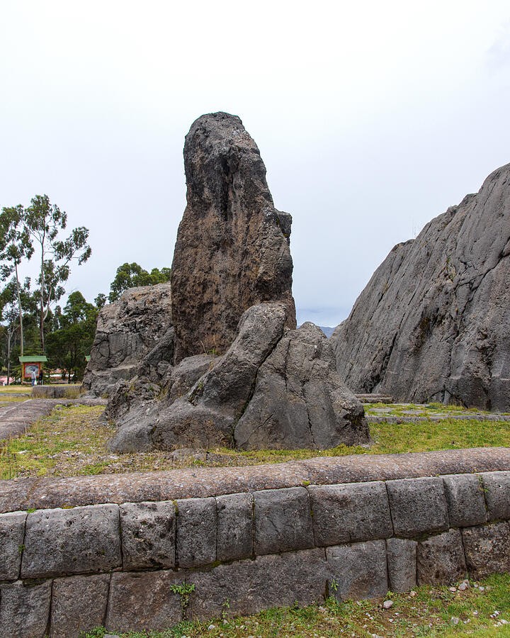 A Tall Rock Above the Low Stone Wall