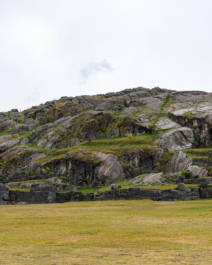Mossy Rock Beyond the Grassy Field