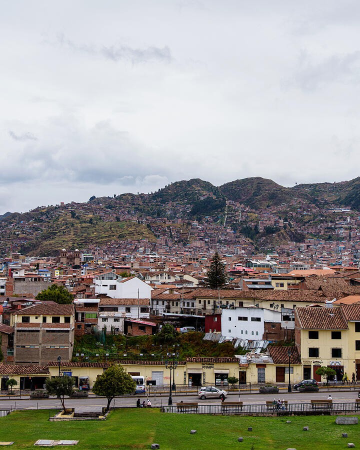 Rooftops Beneath the Cloudy Hills