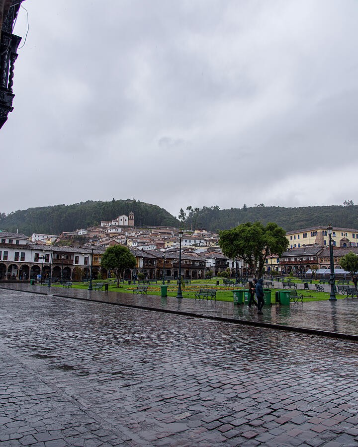 Wet Cobblestones Beside the Plaza