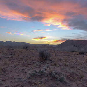 Desert Sunset Over Rugged Terrain by Brandon Wichmann Desert Sunset Over Rugged Terrain by Brandon Wichmann