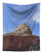 Majestic Mountain Peak Under Blue Sky Tapestry